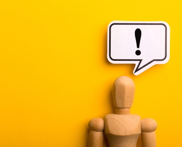 Wooden Person with Notice Thought Bubble