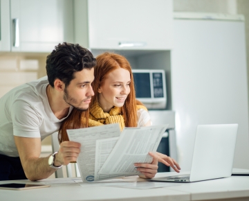 People Looking At Bills