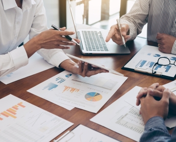 People discussing financials. 